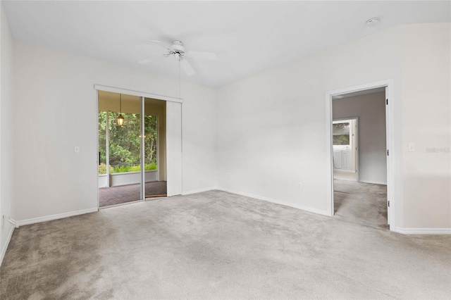 11144 Paradise Point Way, New Port Richey, FL 34654 - empty room with plenty of natural light, carpet flooring, a ceiling fan, and a smoke detector