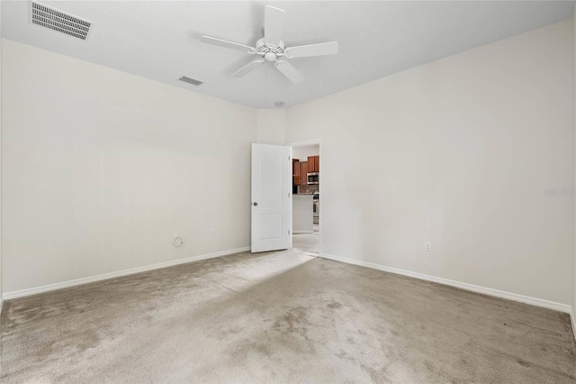 11144 Paradise Point Way, New Port Richey, FL 34654 - spare room with carpet and ceiling fan