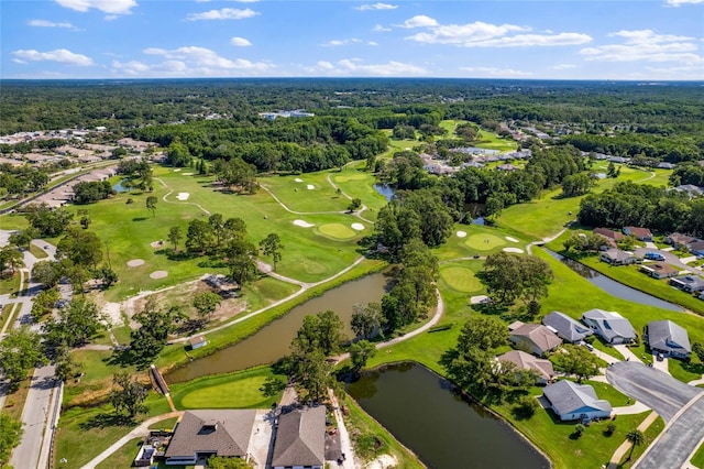 11144 Paradise Point Way, New Port Richey, FL 34654 - aerial overview of property's location with nearby suburban area, a golf club, and a large body of water
