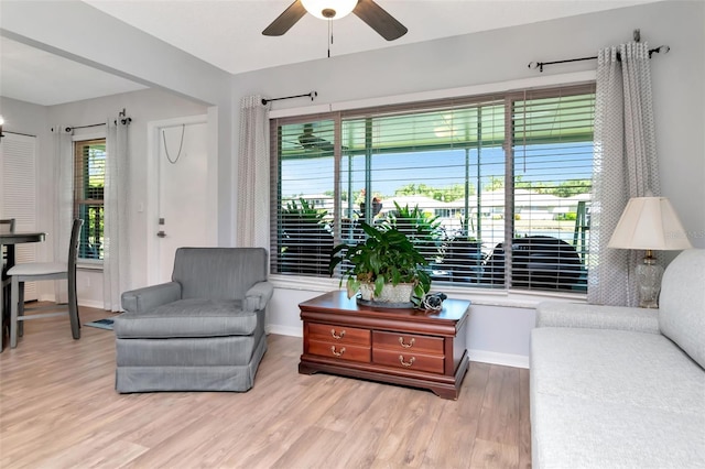717 Manchester Woods Dr Unit 717, Sun City Center, FL 33573 - living area featuring ceiling fan and wood finished floors