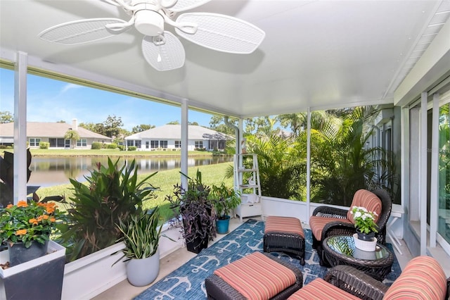 717 Manchester Woods Dr Unit 717, Sun City Center, FL 33573 - sunroom featuring a water view, plenty of natural light, and a ceiling fan