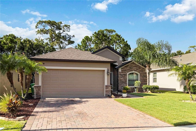 5264 Brilliance Cir, Cocoa, FL 32926 - single story home with stone siding, stucco siding, decorative driveway, and an attached garage
