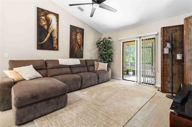 5264 Brilliance Cir, Cocoa, FL 32926 - living room featuring a ceiling fan, carpet, and vaulted ceiling