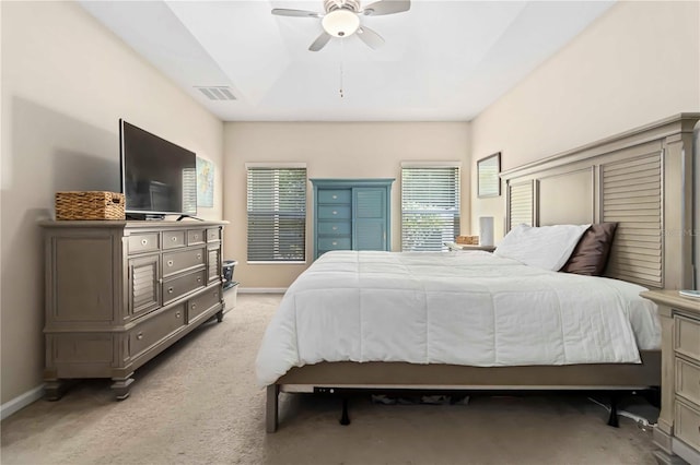 5264 Brilliance Cir, Cocoa, FL 32926 - bedroom with light colored carpet, multiple windows, and a ceiling fan