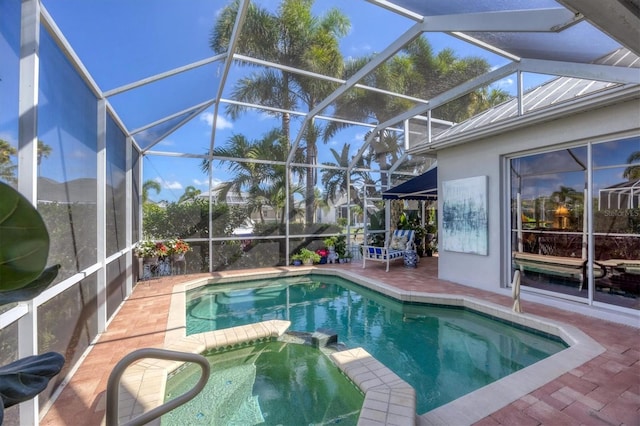 4743 Spinnaker Dr, Bradenton, FL 34208 - view of swimming pool with a patio area, a pool with connected hot tub, and glass enclosure