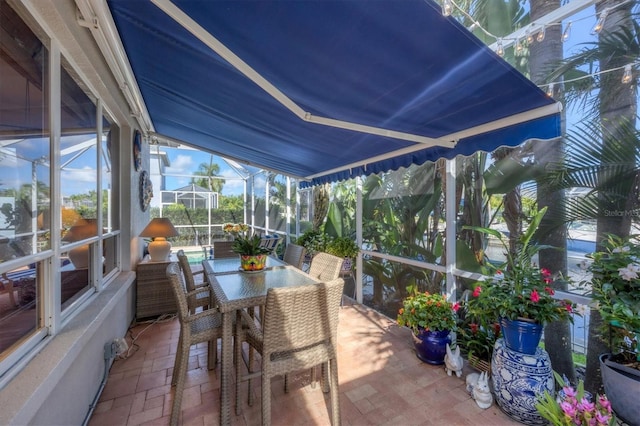 4743 Spinnaker Dr, Bradenton, FL 34208 - sunroom with outdoor dining area