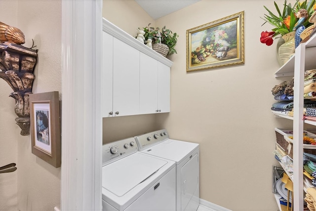 4743 Spinnaker Dr, Bradenton, FL 34208 - laundry room featuring independent washer and dryer and cabinet space