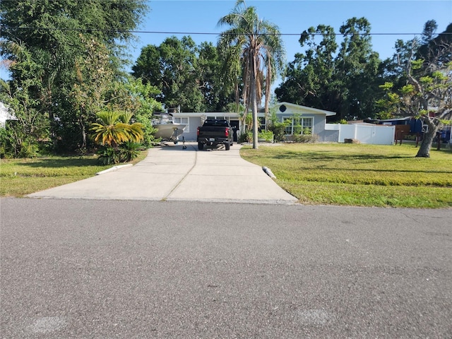 310 4th Ave SW, Ruskin, FL 33570 - view of front of house featuring driveway