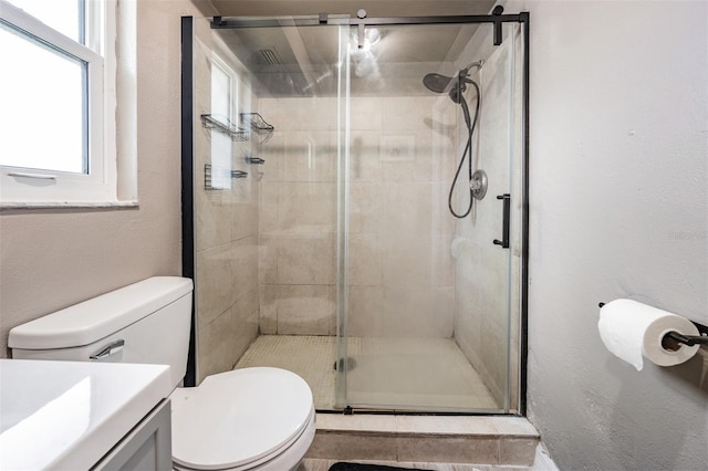 1403 Tallahassee Dr, Tarpon Springs, FL 34689 - bathroom with vanity, a shower stall, and a textured wall