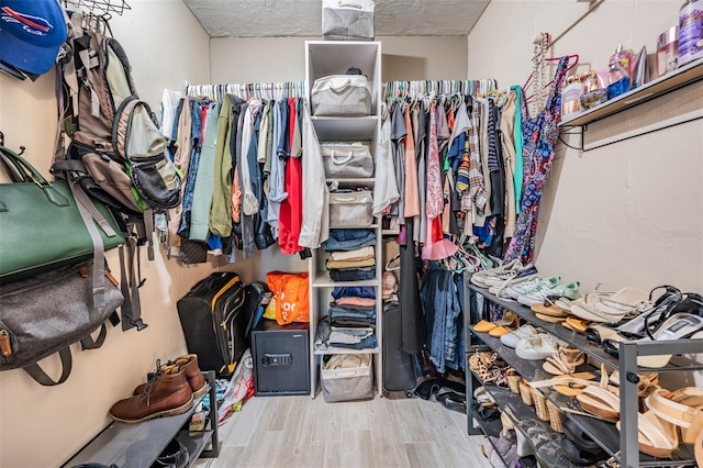 1403 Tallahassee Dr, Tarpon Springs, FL 34689 - spacious closet featuring wood finished floors