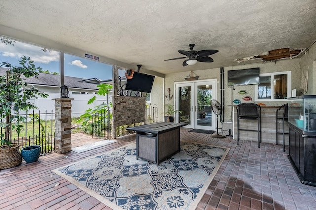 1403 Tallahassee Dr, Tarpon Springs, FL 34689 - view of patio with ceiling fan and french doors