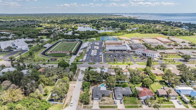 1403 Tallahassee Dr, Tarpon Springs, FL 34689 - aerial perspective of suburban area with a nearby body of water