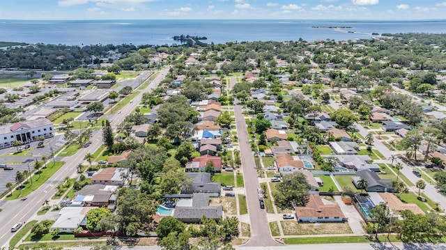 1403 Tallahassee Dr, Tarpon Springs, FL 34689 - aerial perspective of suburban area with a large body of water