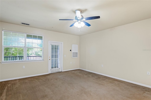 1640 Villa Capri Cir Unit 206, Odessa, FL 33556 - carpeted spare room with ceiling fan and baseboards