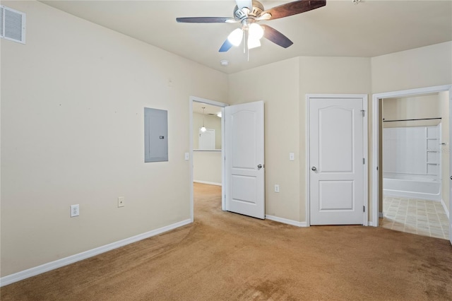 1640 Villa Capri Cir Unit 206, Odessa, FL 33556 - unfurnished bedroom featuring electric panel, light colored carpet, and ceiling fan