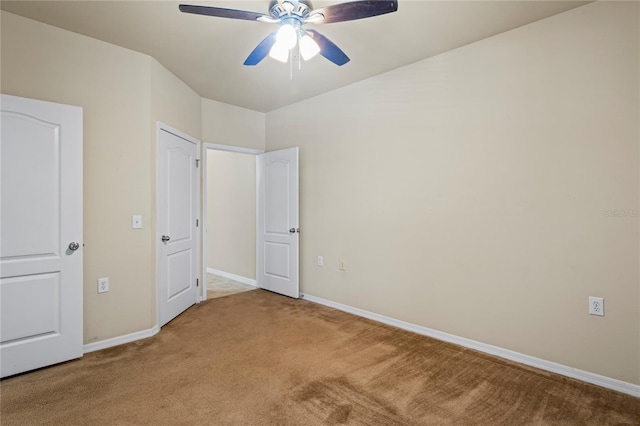 1640 Villa Capri Cir Unit 206, Odessa, FL 33556 - unfurnished bedroom with carpet flooring and a ceiling fan