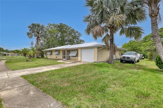 1340 NE Mariposa Dr NE, Palm Bay, FL 32905 - single story home featuring an attached garage, a front yard, a metal roof, driveway, and stucco siding