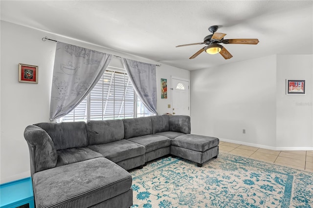1340 NE Mariposa Dr NE, Palm Bay, FL 32905 - living room featuring ceiling fan and tile patterned flooring
