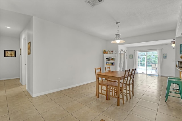 1340 NE Mariposa Dr NE, Palm Bay, FL 32905 - dining area featuring light tile patterned flooring and a ceiling fan