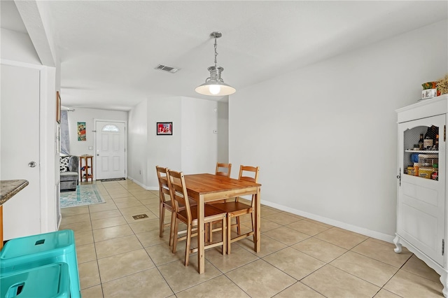 1340 NE Mariposa Dr NE, Palm Bay, FL 32905 - dining space featuring light tile patterned floors