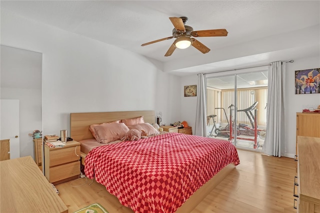 1340 NE Mariposa Dr NE, Palm Bay, FL 32905 - bedroom featuring access to outside, light wood-style floors, and ceiling fan
