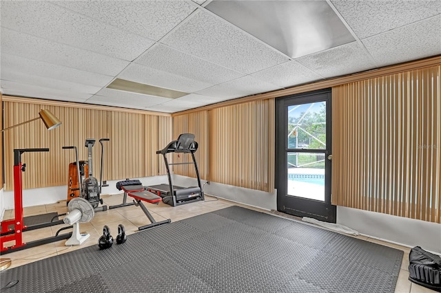 1340 NE Mariposa Dr NE, Palm Bay, FL 32905 - exercise room with tile patterned flooring and a drop ceiling