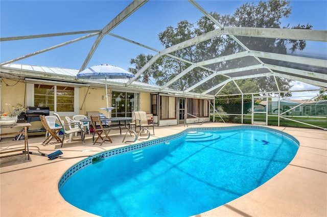 1340 NE Mariposa Dr NE, Palm Bay, FL 32905 - outdoor pool featuring a patio and a lanai