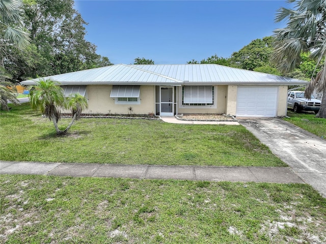 1340 NE Mariposa Dr NE, Palm Bay, FL 32905 - single story home with stucco siding, a garage, a metal roof, driveway, and a front lawn