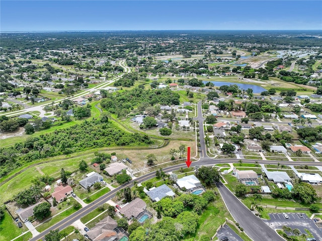 1340 NE Mariposa Dr NE, Palm Bay, FL 32905 - aerial view of property's location with a large body of water and nearby suburban area