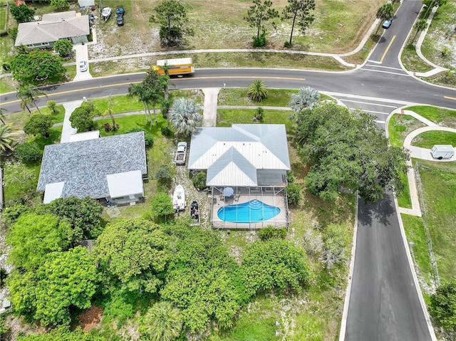 1340 NE Mariposa Dr NE, Palm Bay, FL 32905 - drone / aerial view of a pool area