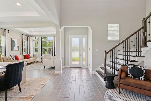 2903 Cordoba Ranch Blvd, Lutz, FL 33559 - entrance foyer featuring stairway, wood finished floors, recessed lighting, and arched walkways