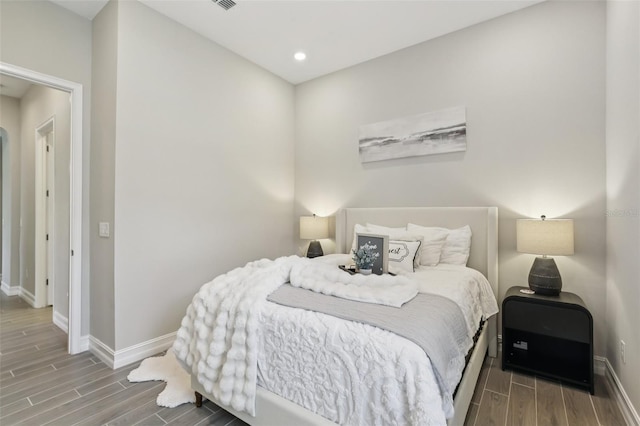 2903 Cordoba Ranch Blvd, Lutz, FL 33559 - bedroom featuring wood tiled floors and recessed lighting
