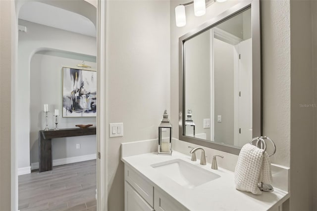 2903 Cordoba Ranch Blvd, Lutz, FL 33559 - bathroom featuring vanity and wood finished floors