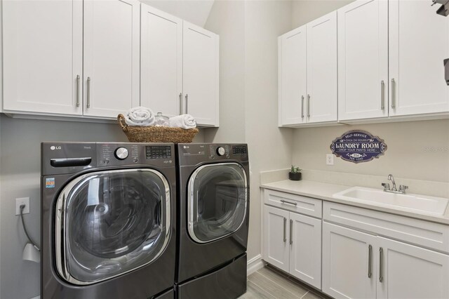 2903 Cordoba Ranch Blvd, Lutz, FL 33559 - laundry area featuring washer and dryer and cabinet space