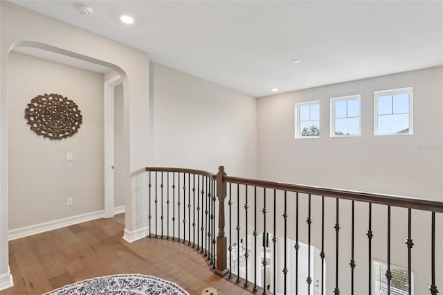 2903 Cordoba Ranch Blvd, Lutz, FL 33559 - corridor featuring wood finished floors, arched walkways, and recessed lighting