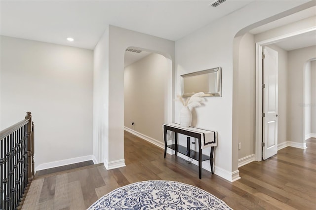 2903 Cordoba Ranch Blvd, Lutz, FL 33559 - hall with arched walkways, wood finished floors, and recessed lighting