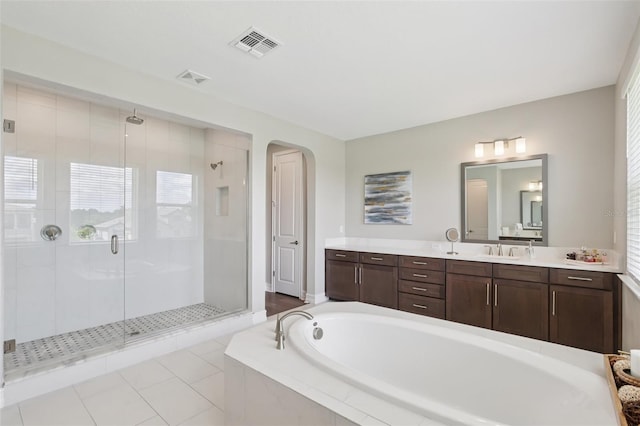 2903 Cordoba Ranch Blvd, Lutz, FL 33559 - full bath featuring a stall shower, a garden tub, vanity, and tile patterned floors