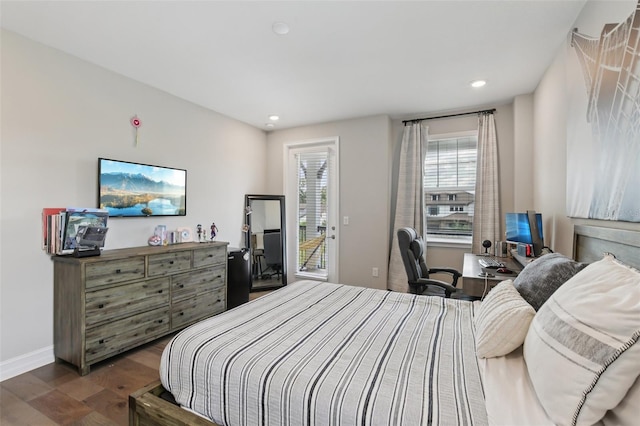 2903 Cordoba Ranch Blvd, Lutz, FL 33559 - bedroom with dark wood finished floors, access to outside, recessed lighting, and a desk