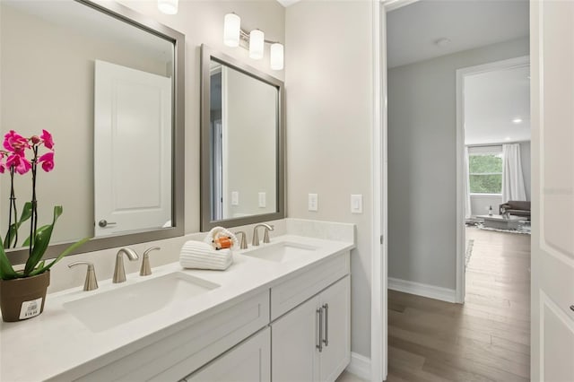 2903 Cordoba Ranch Blvd, Lutz, FL 33559 - full bath with double vanity and wood finished floors