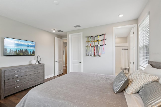 2903 Cordoba Ranch Blvd, Lutz, FL 33559 - bedroom with dark wood-type flooring, multiple windows, recessed lighting, and connected bathroom