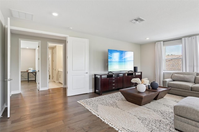 2903 Cordoba Ranch Blvd, Lutz, FL 33559 - living room featuring dark wood-style floors and recessed lighting