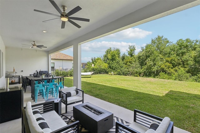 2903 Cordoba Ranch Blvd, Lutz, FL 33559 - view of patio with an outdoor living space with a fire pit and ceiling fan