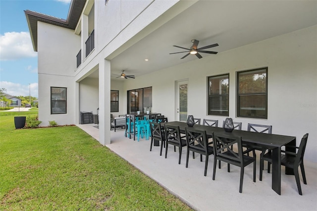 2903 Cordoba Ranch Blvd, Lutz, FL 33559 - view of patio featuring ceiling fan and outdoor dining space