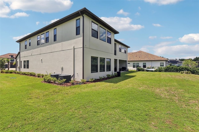 2903 Cordoba Ranch Blvd, Lutz, FL 33559 - back of property with stucco siding and a lawn