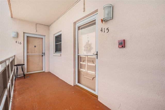 5623 80th St N Unit 415, Saint Petersburg, FL 33709 - property entrance with stucco siding