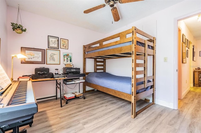 2700 Bayshore Blvd Unit 6210, Dunedin, FL 34698 - bedroom featuring wood finished floors and a desk