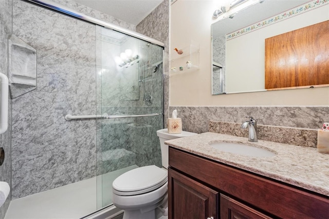 2700 Bayshore Blvd Unit 6210, Dunedin, FL 34698 - bathroom featuring vanity, a shower stall, and tile walls