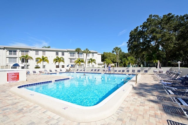 2700 Bayshore Blvd Unit 6210, Dunedin, FL 34698 - community pool featuring a patio