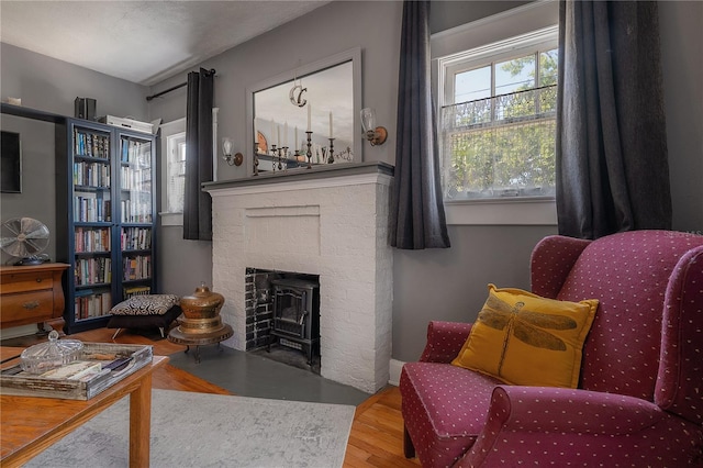 917 W Idlewild Ave, Tampa, FL 33604 - living room with a brick fireplace and wood finished floors