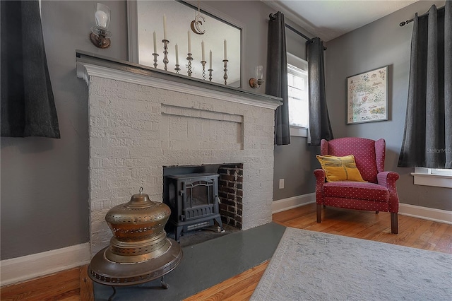 917 W Idlewild Ave, Tampa, FL 33604 - living area with wood finished floors and a wood stove
